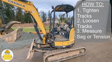 how to change a track on a mini excavator|mini excavator track change.